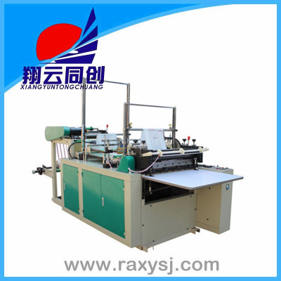 Computerized single-pass heat sealing and cold cutting bag making machine
