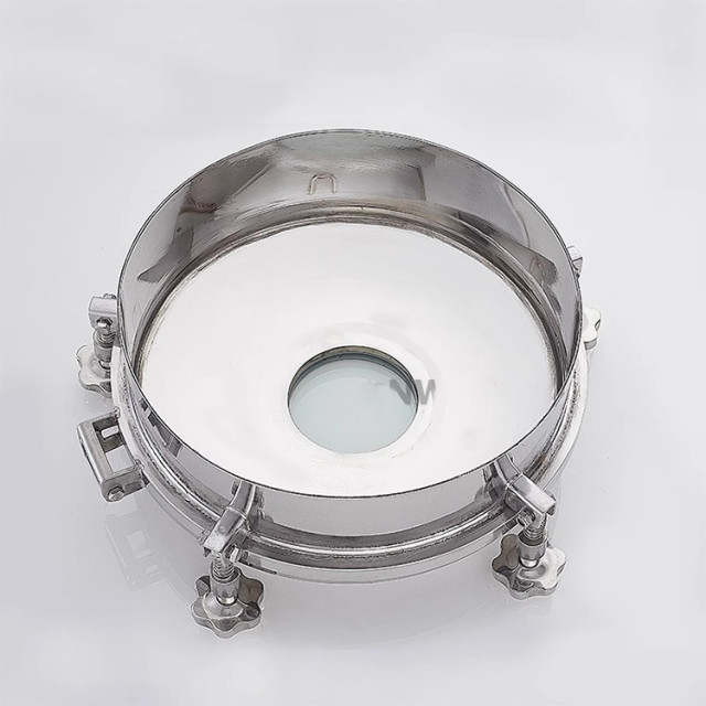 Pressure manhole with sight glass