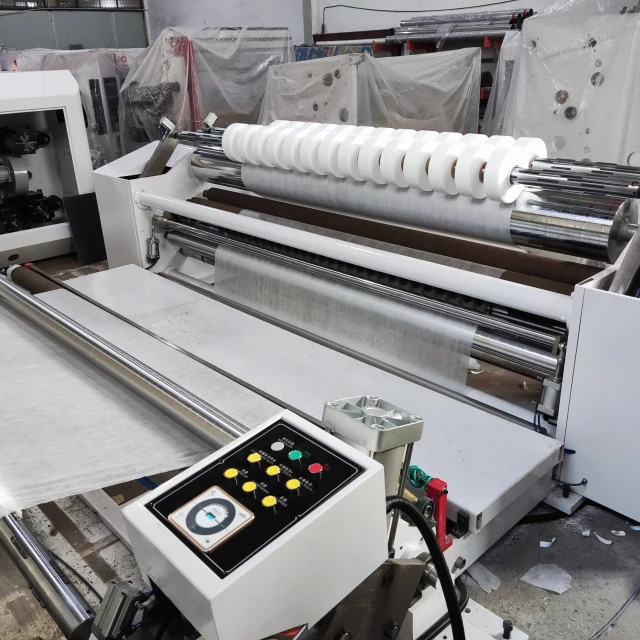 Non woven surface roll slitting machine