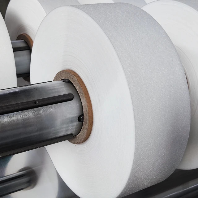 Non woven surface roll slitting machine